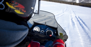 Snowmobiling on a lake in Finland