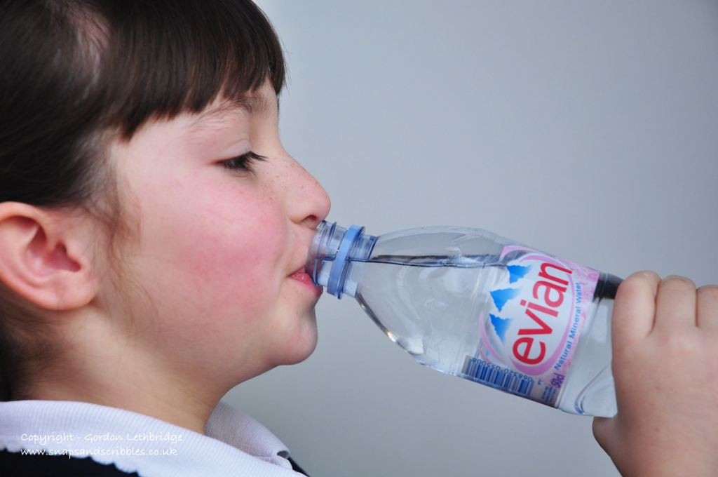 Evian water and child