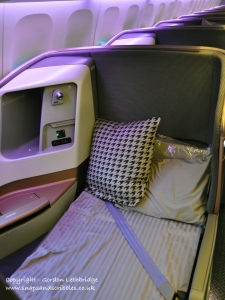 Business Class seat made up as a bed