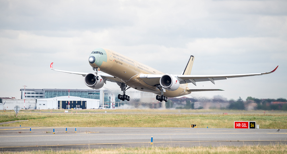 air travel Project Sunrise non-stop flights Qantas A350-1000 taking off from Airbus facility Toulouse France
