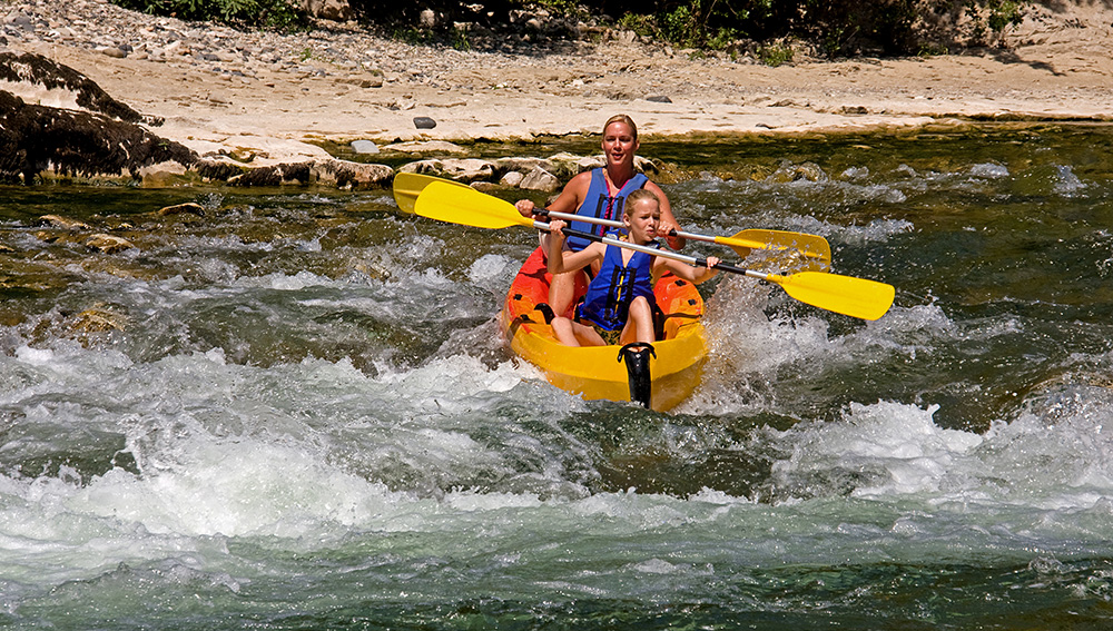 Ardeche Gorge canoe paddling parent and child