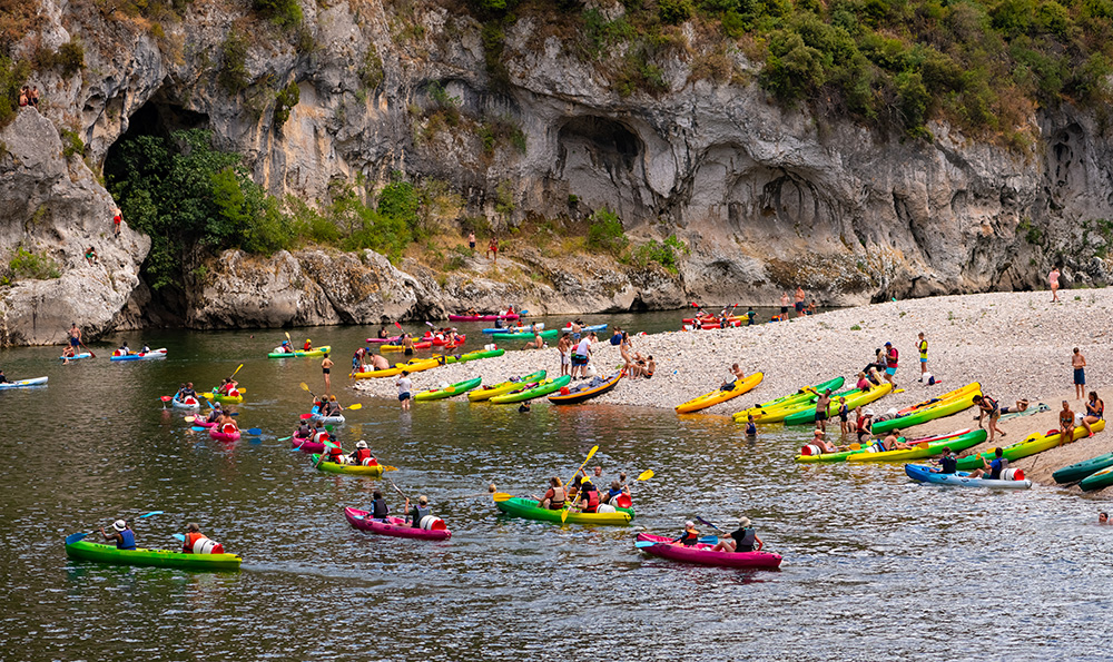 Canoeists on the river in the Ardeche Gorge