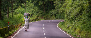 Where in the World 534 woman walking on a road