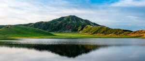 Where in the World 663 mountain reflected in still water lake