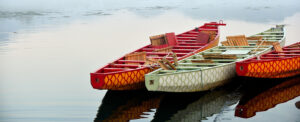 Where in the World 659 featured image colourful boats on still water