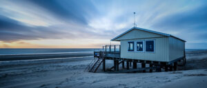 Where in the World 658 house on the beach blue hour