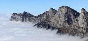 Where in the World 694 mountains clouds featured image