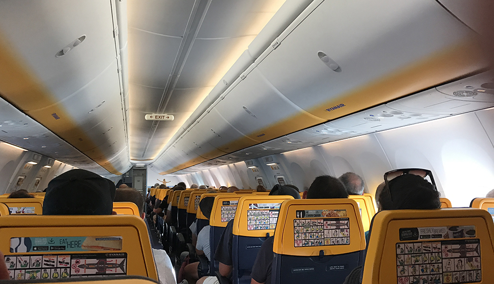 Blue and yellow interior of Ryanair aircraft