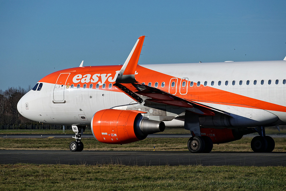 Budget airlines vs Spain easyjet aircraft on tarmac at airport