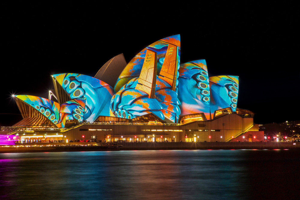 Where in the World 573 Sydney Opera House decorated with laser lights