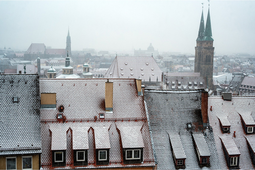 Where in the World 695 quiz snowy rooftops and church of Nuremberg Germany