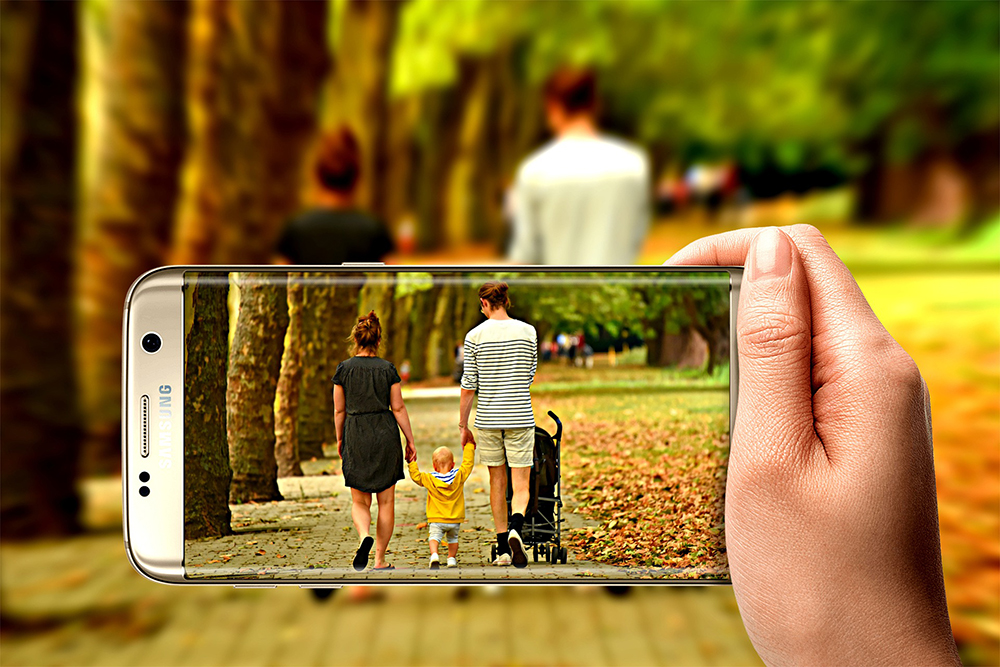 Smartphone video family walking in the woods
