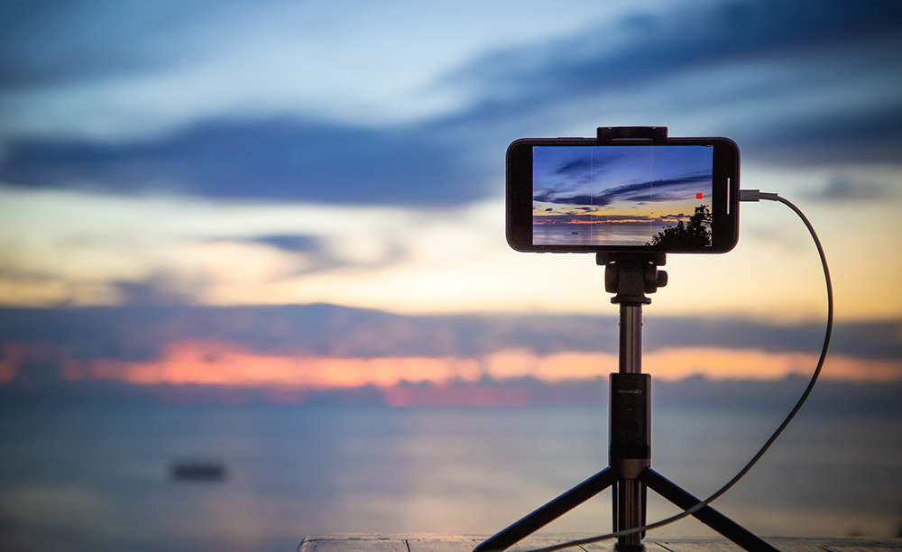 smartphone video tripod and sunset